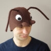 Handmade brown fleece wood ant costume hat for adults. The hat features large white eyes, brown mandibles, and long wired antennae.